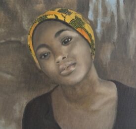Portrait of a woman in a yellow head wrap